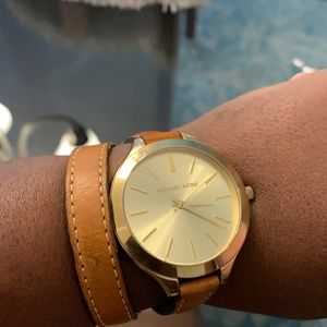 Michael Kors watch with leather band.